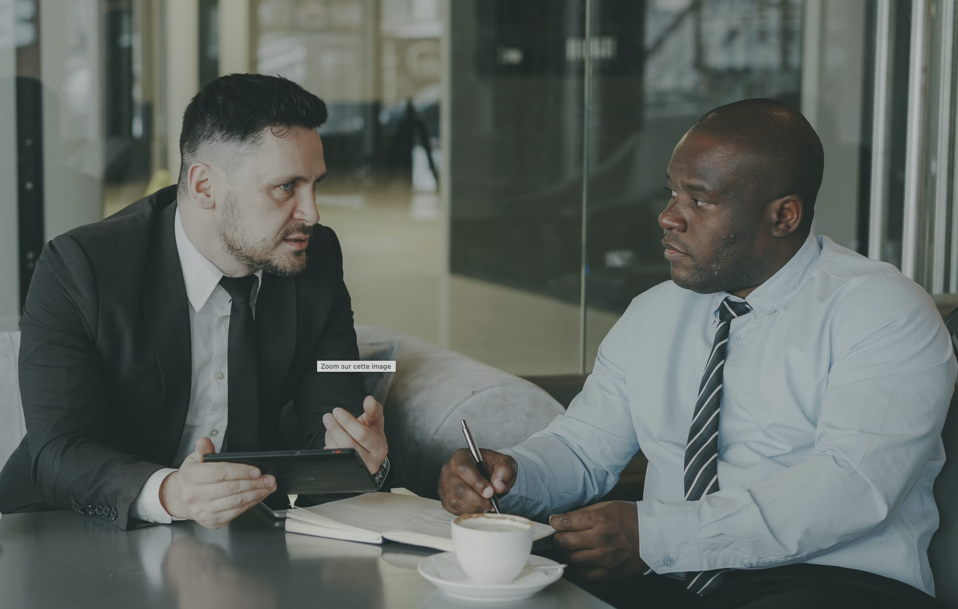 Lawyer presenting options to clients in a meeting
